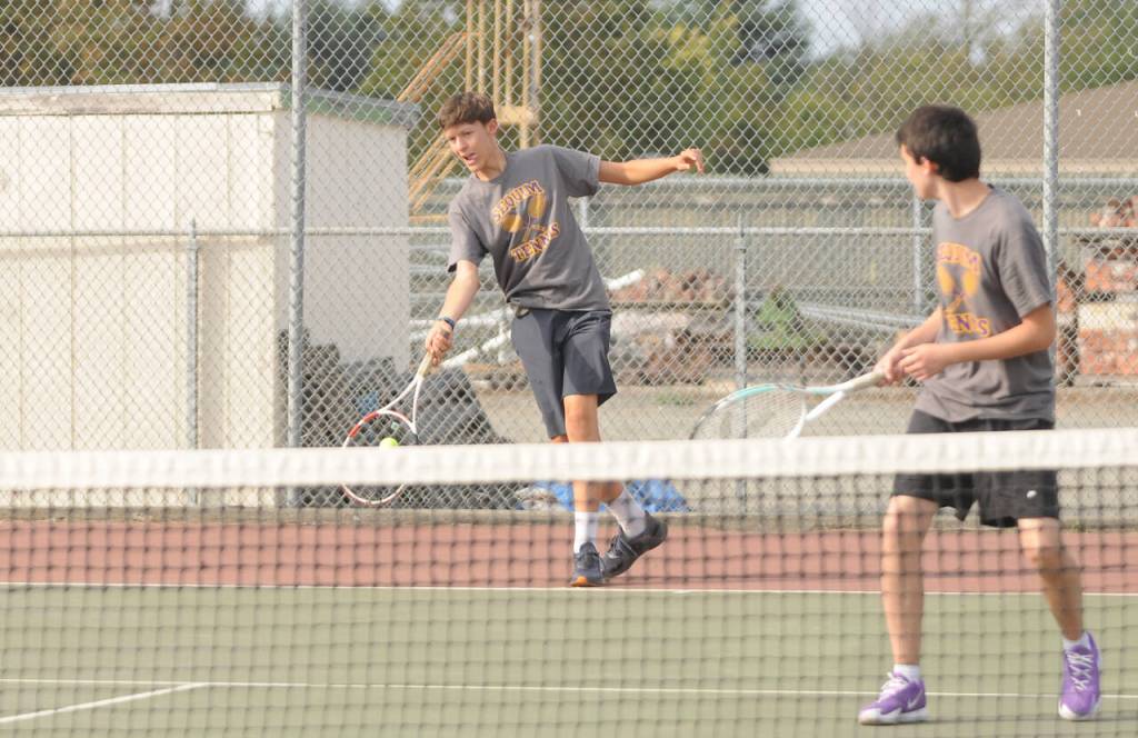 Sequim Gazette photo by Michael Dashiell / Sequims Isaac McKeen and Aason Judd take on North Kitsaps Justin Gallant and Spencer Gillespie on Sept. 13 in No. 2 doubles play. Sequim was scheduled to play Kingston on Sept. 19  results were not available at press time. The Wolves are at Olympic on Sept. 21 and host Port Angeles on Sept. 22.