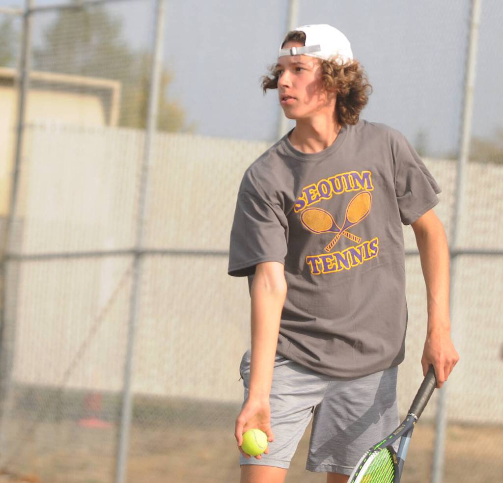 Sequim Gazette photo by Michael Dashiell / Sequims Garrett Little returns a shot as he takes on North Kitsaps Indigo Gallagher-Zapf in No. 1 singles play on Sept. 13. Sequim was scheduled to play Kingston on Sept. 19. Little topped Gallagher-Zapf 6-1, 6-0. The Wolves are at Olympic on Sept. 21 and host Port Angeles on Sept. 22.