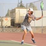 Sequim Gazette photo by Michael Dashiell / Sequims Garrett Little looks to return a shot as he takes on North Kitsaps Indigo Gallagher-Zapf in No. 1 singles play on Sept. 13. Sequim was scheduled to play Kingston on Sept. 19  results were not available at press time. The Wolves are at Olympic on Sept. 21 and host Port Angeles on Sept. 22.