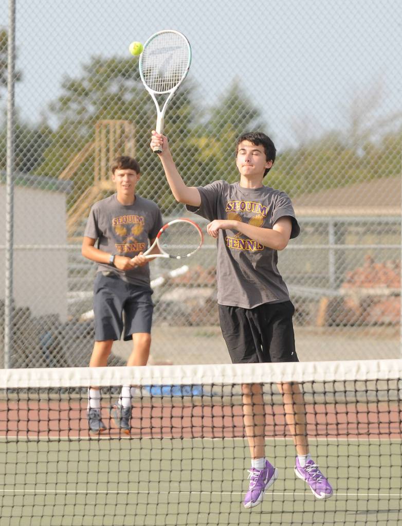 Sequim Gazette photo by Michael Dashiell / Sequims Isaac McKeen and Aason Judd take on North Kitsaps Justin Gallant and Spencer Gillespie on Sept. 13 in No. 2 doubles play. The Wolves are at Olympic on Sept. 21 and host Port Angeles on Sept. 22.