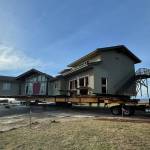 Sequim Gazette photo by Matthew Nash/ This Dungeness home was placed about 120 feet from the hillside on Sept. 16. Crews will work on utilities and foundation work in the coming month.