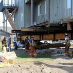 Sequim Gazette photo by Matthew Nash/ Large wooden planks helped Nickel Bross crew to better move a Dungeness home on Sept. 16.