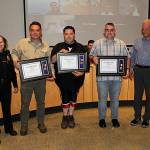 Sequim Gazette photo by Matthew Nash
For their efforts to help save a Sequim police officer being attacked in May, Ryan Ross, Daniel Anselmo, and James Mike Blouin were honored with Citizen Commendation Awards on Sept. 12 by Sequim Police Chief Sheri Crain and Sequim mayor Tom Ferrell.