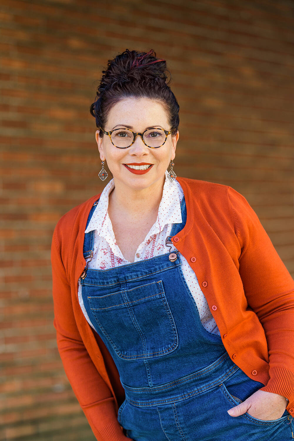 Submitted photo / Donna Barba Higuera, a Washington-based author, visits with students from the Quileute Tribal School, and the Cape Flattery and Quilayute Valley school districts on Oct. 7, to discuss her book Lupe Wong Wont Dance.