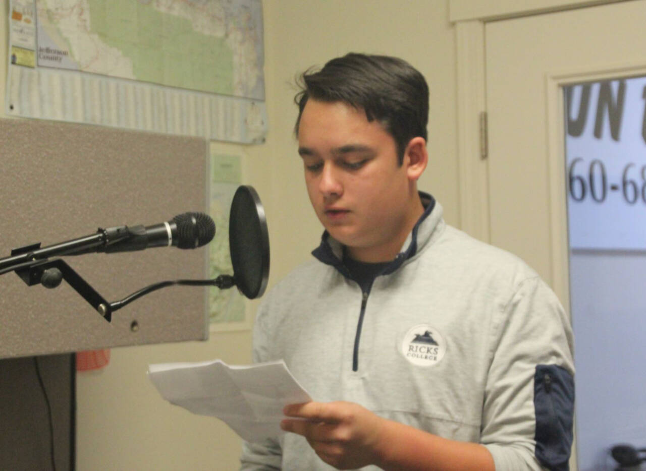 Submitted photo / Caleb Keith, 15, of Port Angeles, takes part in the Junior American Citizens groups observance of Constitution Week, reading a message at Sequims KSQM 91.5 FM radio station.