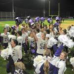 KEITH THORPE/PENINSULA DAILY NEWS
Members of the Sequim Wolves football team and cheer squad celebrate Friday night's 36-32 come-from-behind victory over the Port Angeles Roughriders at Port Angeles Civic Field.