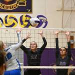 Michael Dashiell/Sequim Gazette
Sequims Jolene Vaara, center, and Arianna Stovall look to block a shot by Olympics Ellie Swan in a league match-up on Sept. 20.