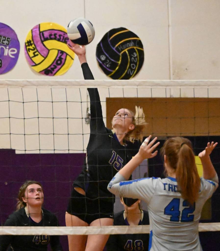 Sequim Gazette photo by Michael Dashiell / Sequim senior Kendall Hastings looks to hit a shot past Olympics Naomi Lipski as SHSs Jordan Kidd, left, looks on in a league match-up on Sept. 20.