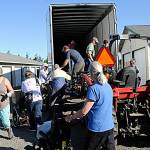 Matthew Nash/Sequim Gazette
More than 500 wheelchairs, walkers, canes, crutches and walking sticks were loaded onto a tractor-trailer by Dungeness Community Church volunteers on Sept. 20 at All-Safe Mini Storage. Organizers have worked nearly two years to gather and ship the supplies to Guatemala.