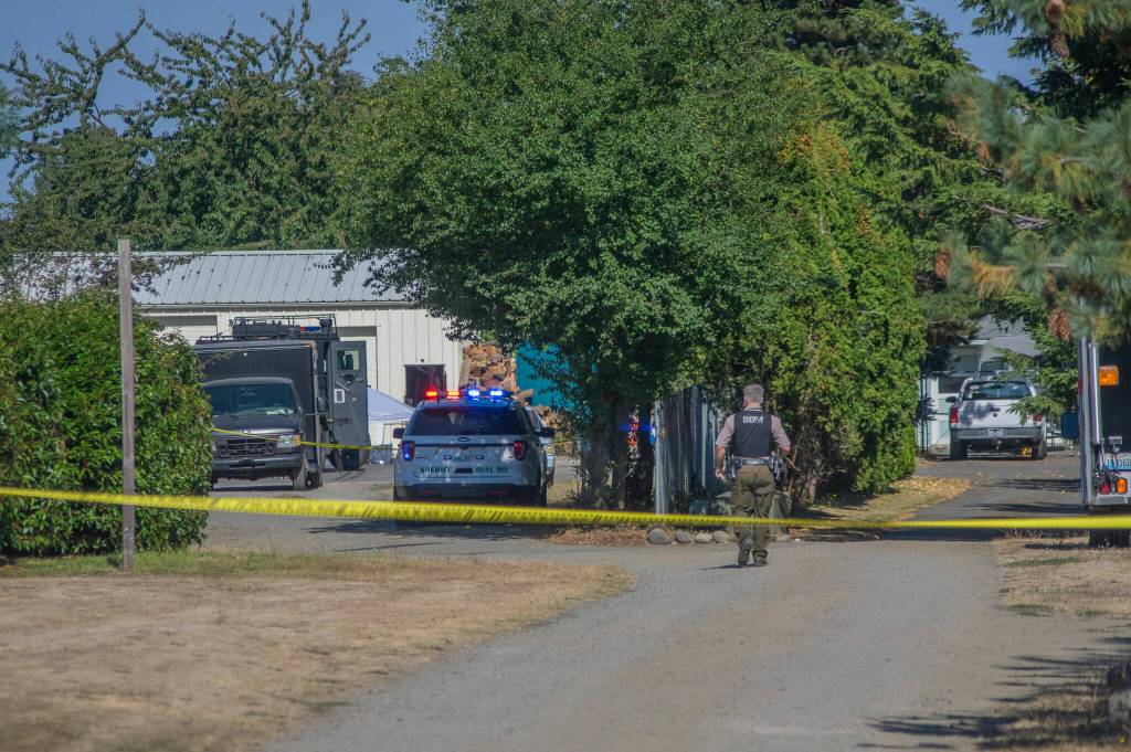 Sequim Gazette photo by Emily Matthiessen
Members of the Kitsap Critical Incident Response Team (KCIRT) investigate an active shooter situation off Priest Lane on Sept. 22.