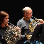 Photos by Diane Urbani de la Paz 
French horn players Kat Creekmore and Bruce Kelley rehearse for this Friday and Saturdays Family Pops concerts at the Port Angeles High School Performing Arts Center.
