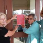 Submitted photo / From left, Carol Pope of Sequim and Sue Pierce and Candice Olsen, both of Port Angeles, are among the two dozen women preparing for Dungeness Valley Lutheran Churchs Yuletide Bazaar Nov. 19.