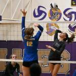 Sequim Gazette photo by Michael Dashiell / Sequims Arianna Stovall, right, looks to hit past Bremertons Helene Rode in a three-set Sequim win on Sept. 29.