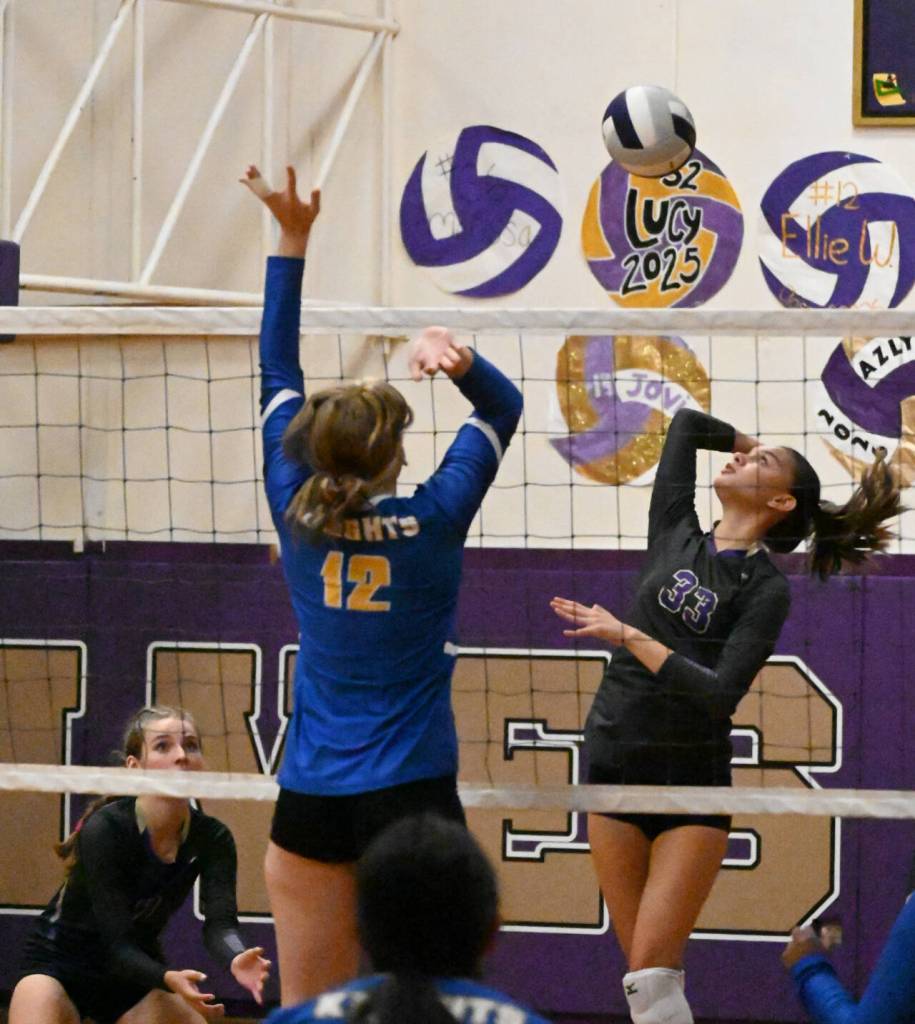 Sequim Gazette photo by Michael Dashiell / Sequims Arianna Stovall, right, looks to hit past Bremertons Helene Rode in a three-set Sequim win on Sept. 29.