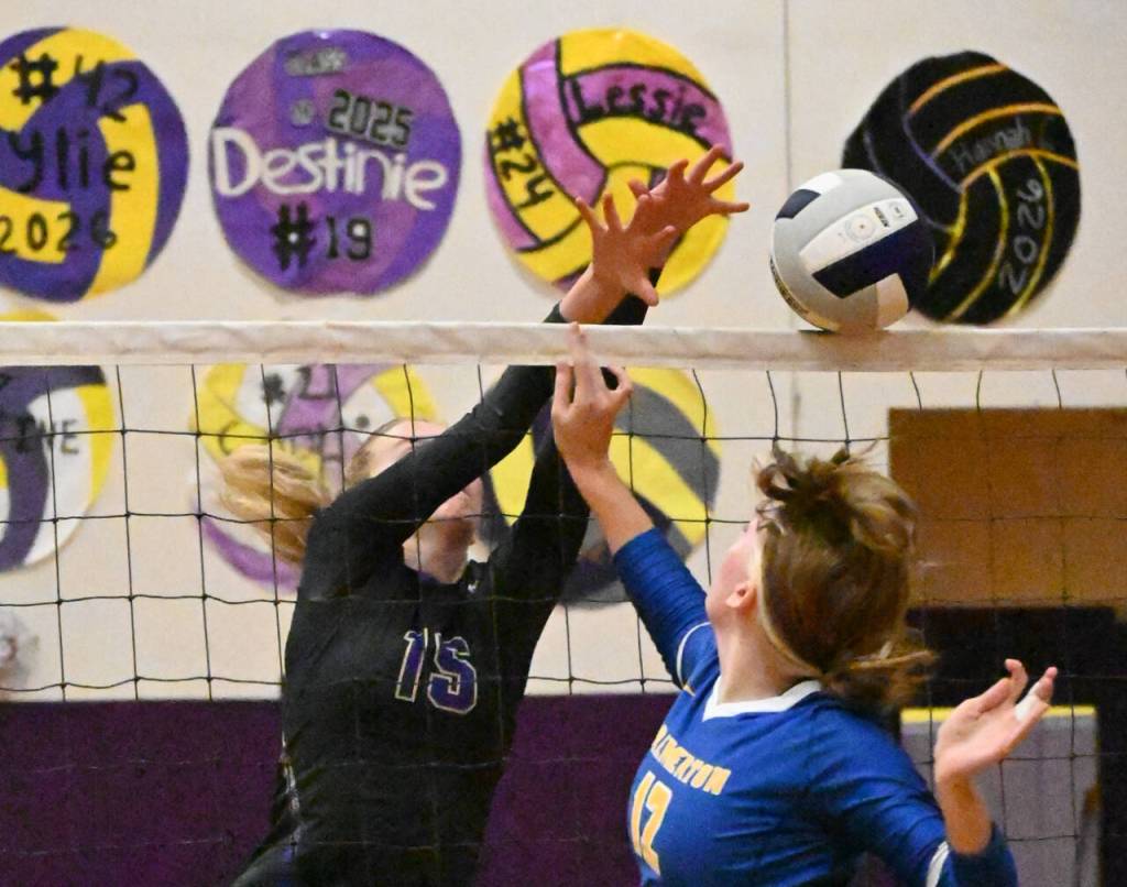 Sequim Gazette photo by Michael Dashiell / Sequims Kendall Hastings blocks a tip shot by Bremertons Helen Rode in the Wolves three-set home win on Sept. 29.