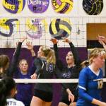 Sequim Gazette photo by Michael Dashiell / Sequim teammate celebrate a big block by senior Kendall Hastings (15) in a straight set win over Bremerton on Sept. 29.