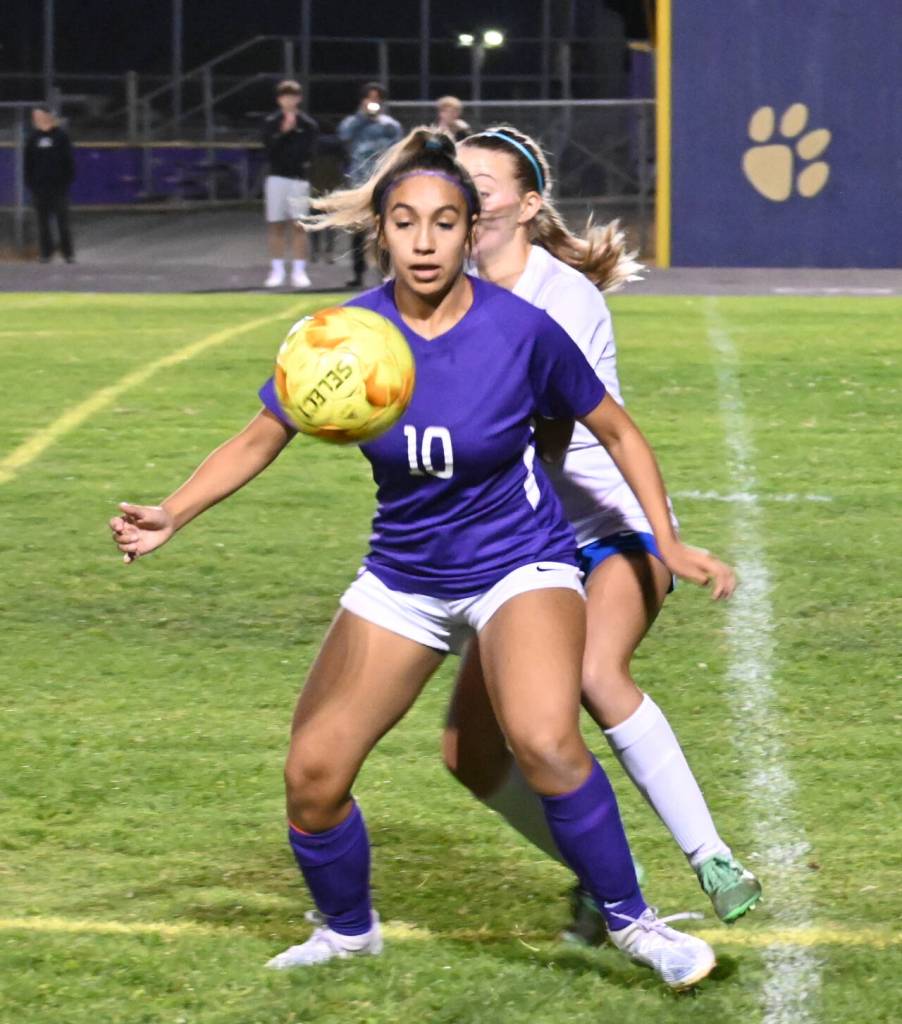 Sequim Gazette photos by Michael Dashiell
Sequims Jennyfer Gomez vies for the ball with Bremertons Melanie Uhrich in the Wolves 4-0 win in Sequim on Sept. 29.