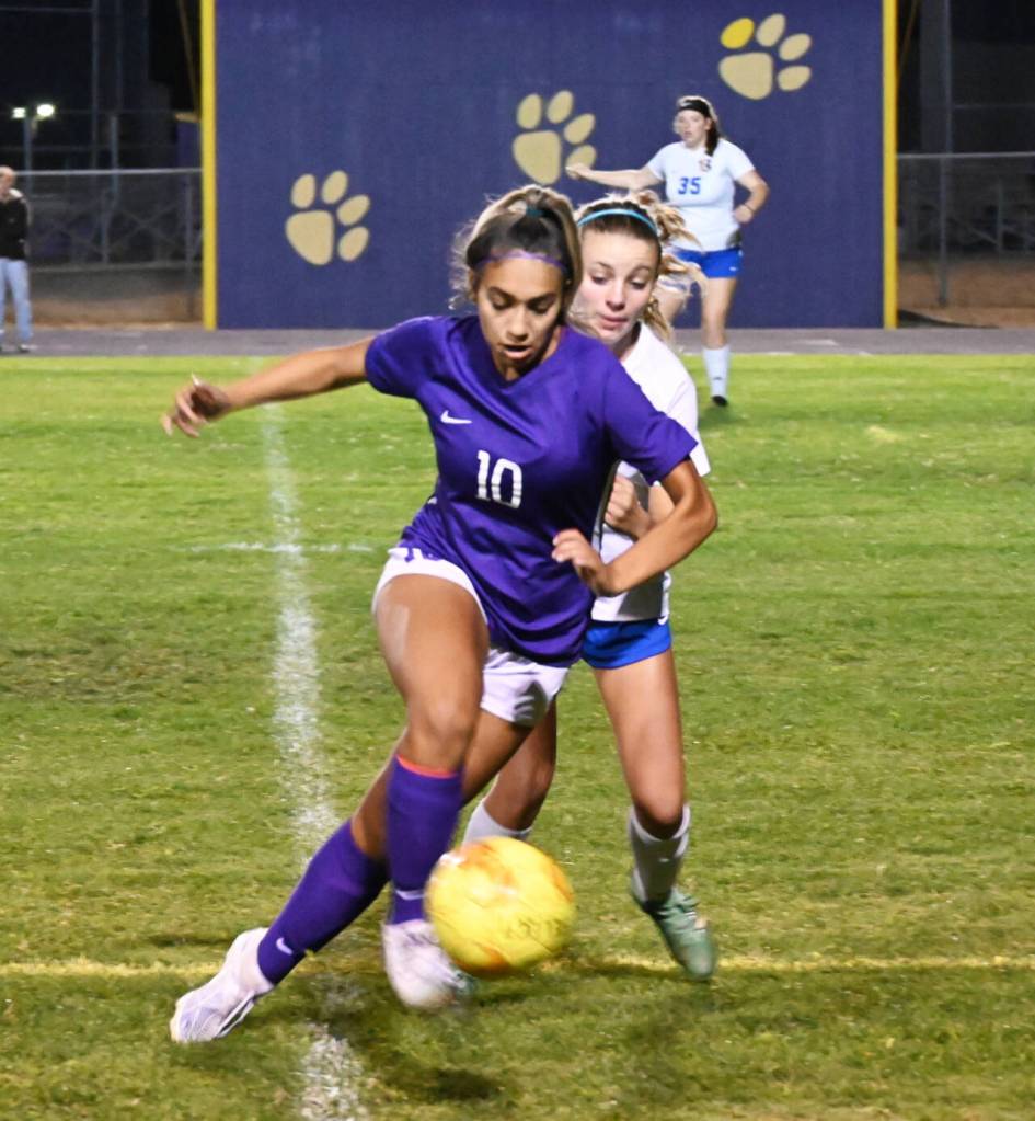 Sequim Gazette photos by Michael Dashiell
Sequims Jennyfer Gomez vies for the ball with Bremertons Melanie Uhrich in the Wolves 4-0 win in Sequim on Sept. 29.