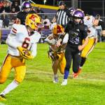 Sequim Gazette photo by Michael Dashiell / Sequims Sam Fitzgerald looks to tackle Kingstons Hans Reber in the second half of the Wolves 27-13 Homecoming win on Sept. 30.