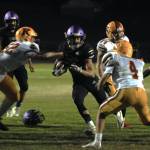 Sequim Gazette photo by Michael Dashiell / Sequims Aiden Gockerell, center, drives into the end zone for a first quarter touchdown in the Wolves 27-13 Homecoming win over Kingston on Sept. 30.