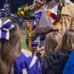 Sequim Gazette photo by Emily Matthiessen / Friends celebrate Sequim Highs 2022 Homecoming Queen and King, Claire DAmico and Aaron Tolberd, at halftime of the SHS football game on Sept. 30.