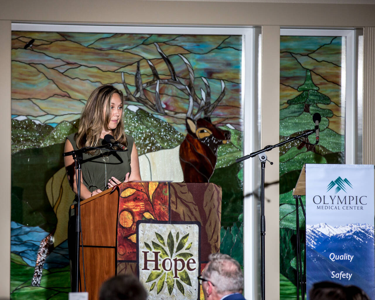 Photo courtesy of Olympic Medical Center Foundation / Carrie Wallin of the Fred Hutchinson Cancer Center talks about the institutions long relationship with the OMC Cancer Center at the Harvest of Hope dinner in Sequim on Sept. 30.