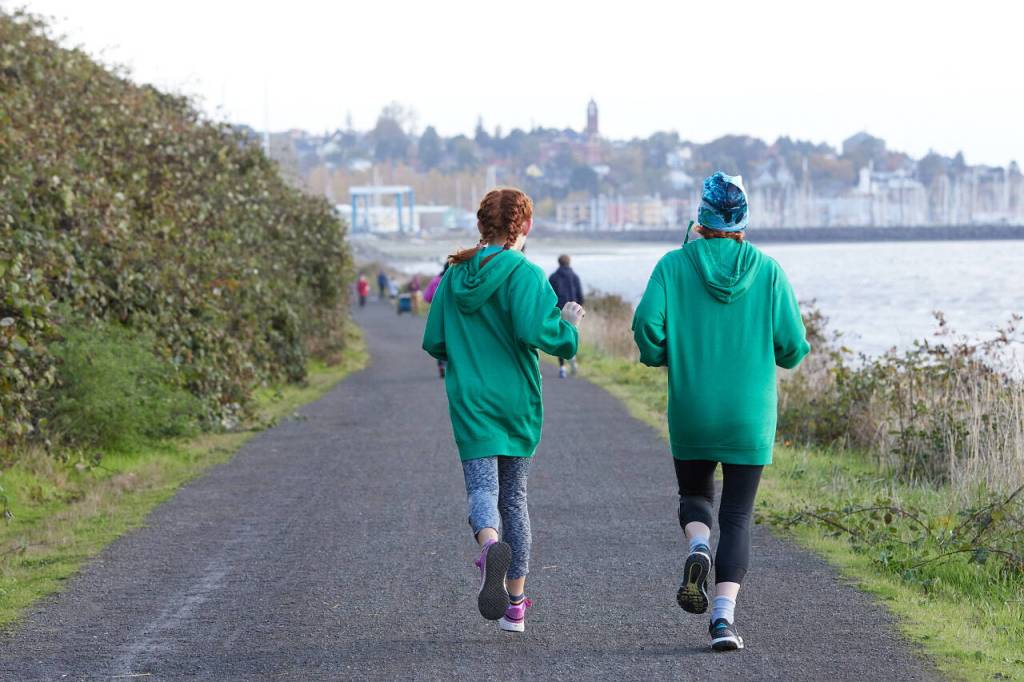 Photo courtesy of Run the Peninsula / Participants race toward the finish line at the third-annual Larry Scott Trail 5k/10k/half-marathon in 2021.