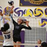 Sequim Gazette photo by Michael Dashiell / With teammate Mia Coudriet, right, looking on, Sequims Kendall Hastings looks to hit a ball past North Masons Adrianna Tupolo in the Wolves four-set home win on Sept. 6.