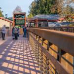 Sequim Gazette photo by Emily Matthiessen 
Pedestrians and bicyclists last week check out the newly-reopened bridge at Railroad Bridge Park, part of the Olympic Discovery Trail.