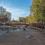 Sequim Gazette photo by Emily Matthiessen 
Pedestrians and bicyclists last week check out the newly-reopened bridge at Railroad Bridge Park, part of the Olympic Discovery Trail.