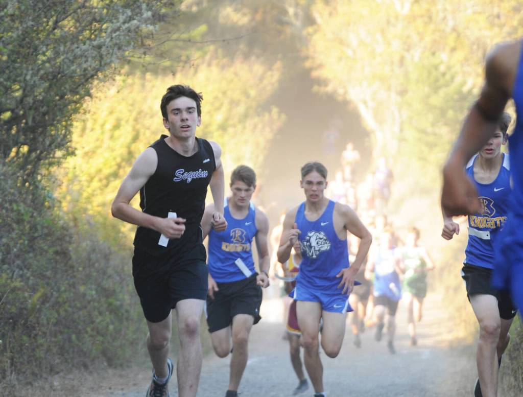 SEQUIM GAZETTE PHOTO BY Michael Dashiell
Sequim freshman Colin Feik races with the lead pack in the early stages of an Olympic League meet at Voice of America Park on Oct. 12. Feik finished 22nd overall in 18:53.