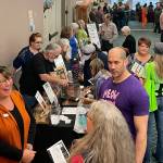 Sequim Gazette photo by Matthew Nash/ More than 30 businesses and agencies attended the 14th annual Business Showcase on Oct. 12 in Sunlands clubhouse.