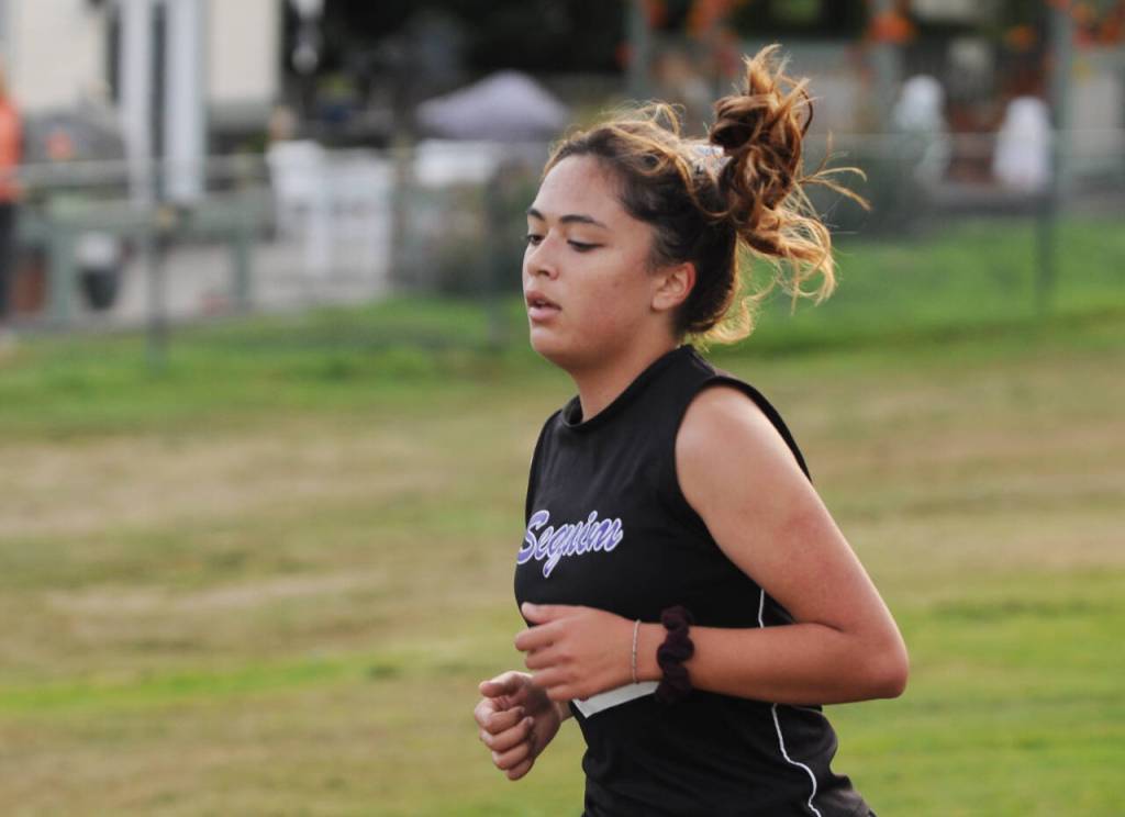 Sequim Gazette photo by Michael Dashiell / Sequim High freshman Ahrya Klinger places 30th at the Olympic League cross country championships on Oct. 20, helping the Wolves place third overall and qualify as a team for the West Central District meet.