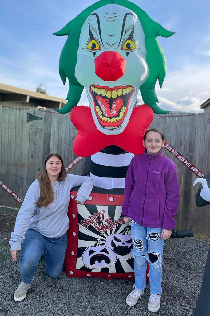 Sequim Gazette photo by Matthew Nash
This clown Jack-in-the-box is one of the newest decorations at the home of Sierra Lomker, left, and Abby Vogel along West Prairie Street.
