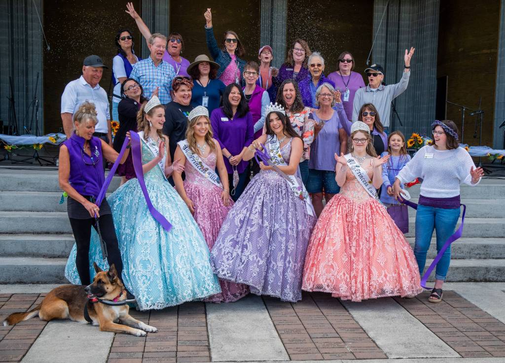 Sequim Gazette photo by Emily Matthiessen / Irrigation Festival royalty and Chamber of Commerce dignitaries celebrate the kickoff/opening of the 2022 Sequim Lavender Festival. Queen Isabella Williams cut the ribbon.
