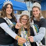 Matthew Nash/SEQUIM GAZETTE
Sequim Irrigation Festival royalty, from left, queen Isabella Williams, princess Lauren Willis, and princess Katherine Gould helped promote Down syndrome Awareness Month on Oct. 20 in front of Sequim Walmart. The effort was part of Willis platform for being on royalty.