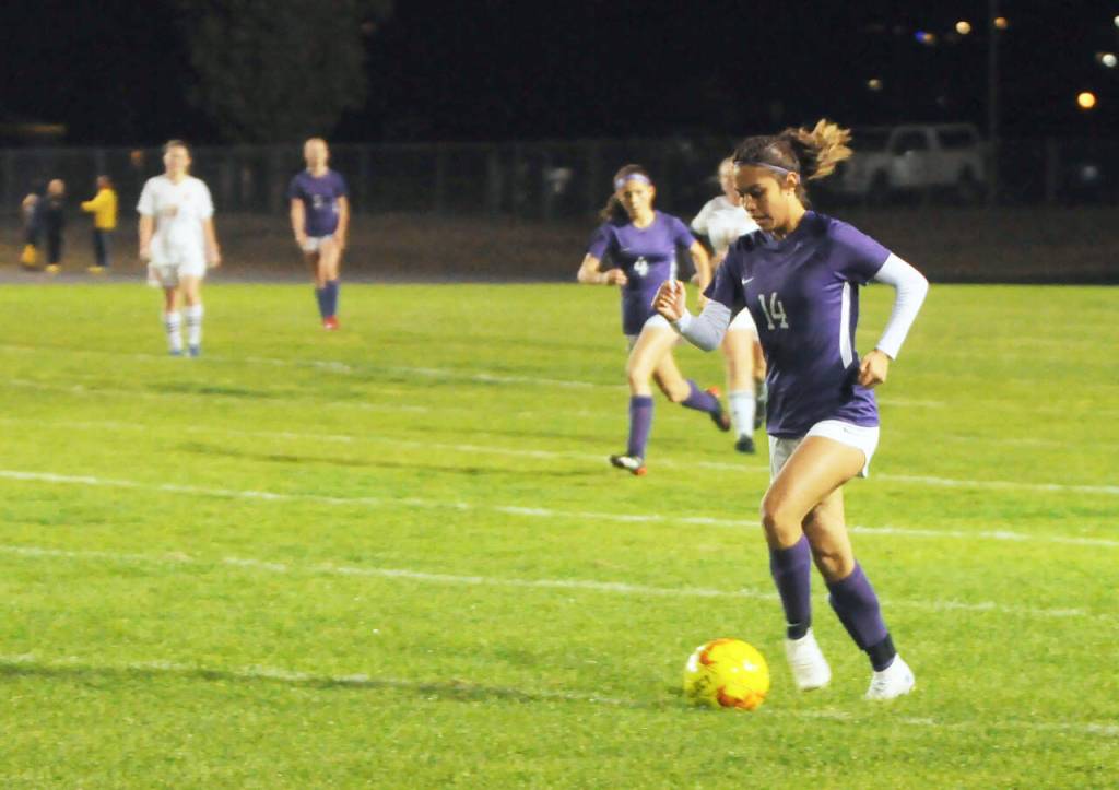 Sequim Gazette photo by Michael Dashiell / Sequims Alex Salas advances the ball into Kingston territory in the first half of the Wolves 4-0 win over the Buccaneers on Oct 27.