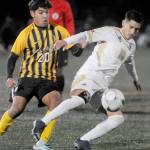 Photo by Keith Thorpe/Olympic Peninsula News Group / Peninsulas Fernando Tavares keeps the ball away from Walla Wallas Nathan Alvarado during a Nov. 5 NWAC semifinal match at Peninsula College in Port Angeles.