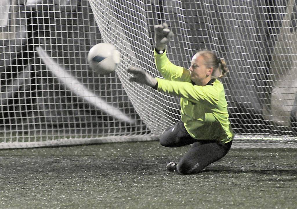 Photo by Keith Thorpe/Olympic Peninsula News Group / Peninsula goalkeeper Frida Markstrom fends off shot during a penalty shootout to determine a winner of a Nov. 5 NWAC semifinal game against Spokane at Peninsula College in Port Angeles.