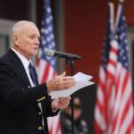 Sequim Gazette photo by Michael Dashiell / Col. Tom Johnson (U.S. Marine Corps, ret.) of Sequim speaks to a Veterans Day Ceremony audience at the Sequim Civic Center plaza on Nov. 11.