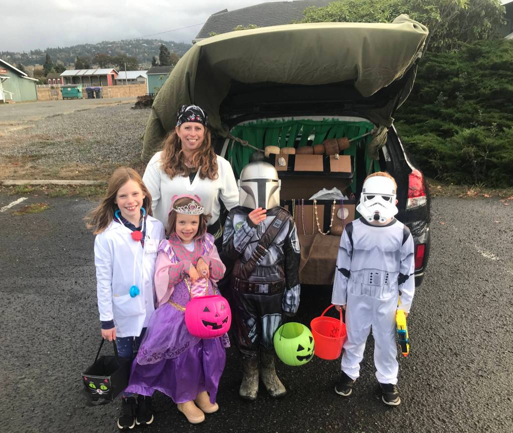Photo courtesy of Karen Huber / Trunk-or-treaters enjoy the holiday at Thrive Church.