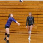Sequim Gazette photo by Emily Matthiessen / As Jolene Vaara looks on, Sequim libero Mia Coudriet passes to a teammate in the Wolves three-game sweep of Port Angeles on Nov. 3.