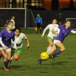 Sequim Gazette photos by Michael Dashiell 
Above: Sequims Alliyah Weber, left, and Taryn Johnson advance the ball into Clover Park territory in the Wolves 2-0 win in the opening round of the West Central District tourney on Nov. 1.
At right: Sequims Jennyfer Gomez, left, battles with a Clover Park midfielder in the Wolves 2-0 win