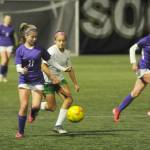 Sequim Gazette photo by Michael Dashiell / As teammate Ivy Barrett, right, looks on, Sequims Alliyah Weber advances the ball into Clover Park territory in the Wolves 2-0 win on Nov. 1.