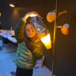 Photo courtesy of Port Angeles Fine Arts Center / Miles Fradkin holds up a lantern he made at one of last years youth workshops.