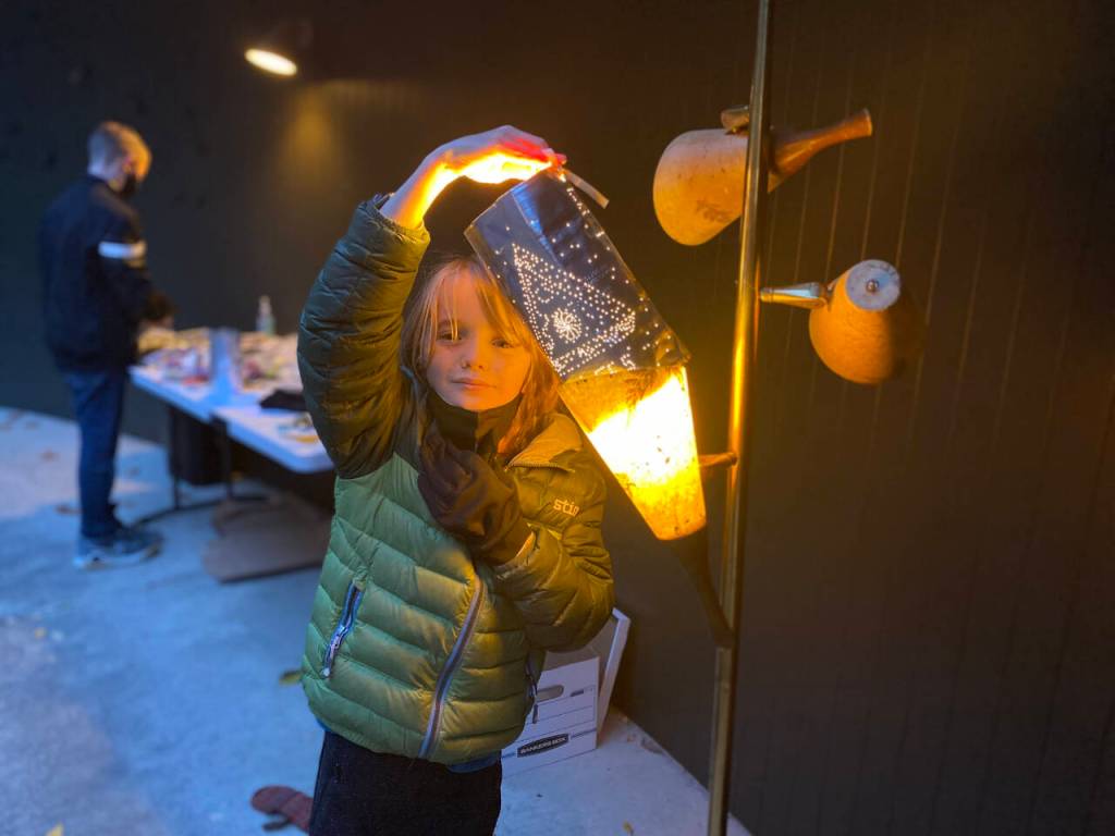 Photo courtesy of Port Angeles Fine Arts Center / Miles Fradkin holds up a lantern he made at one of last years youth workshops.
