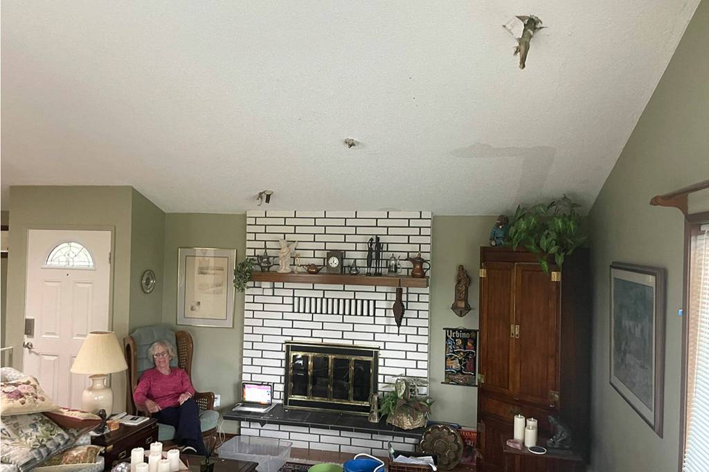 Sequim Gazette photo by Matthew Nash
In her Sunland home, Nattalia Sharinger-Gellert was listening to relaxing music on her computer with headphones on Friday night next to her fireplace when a branch came down and punctured three visible holes through the ceiling. I feel lucky, she said. She and her husband Daniel Gellert stayed in a hotel that night and are assessing next steps for repairs.