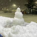 Sequim Gazette photo by Matthew Nash/ A mini-snowman greets the few drivers out at the Sequim Costco Fuel Station during the snowstorm on Nov. 7.