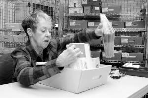 Photo by Keith Thorpe/Olympic Peninsula News Group / Election worker Phyllis Lawyer of Sequim sorts ballots on election day (Tuesday, Nov. 8) at the Clallam County Courthouse in Port Angeles.