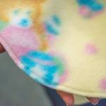 A close-up of a fleece blanket made by the volunteers of the Sequim Serger Squad shows the type of stitch a serger machine produces to edge blankets. Members say sergers are so fast sometimes the people cutting material cant cut fast enough. Members seek to build a stockpile of blankets so when a request for children in need reaches them they can send the blankets immediately.